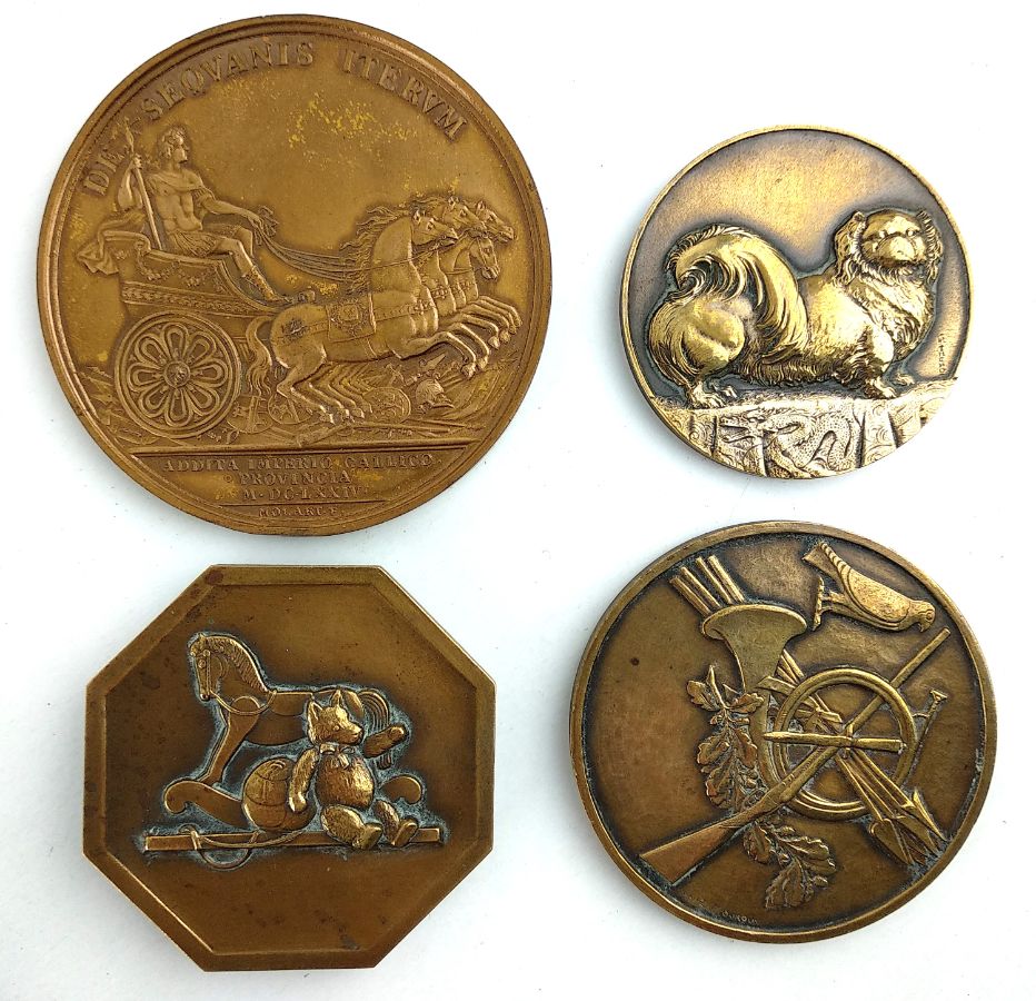 Quatro Medalhas em Bronze