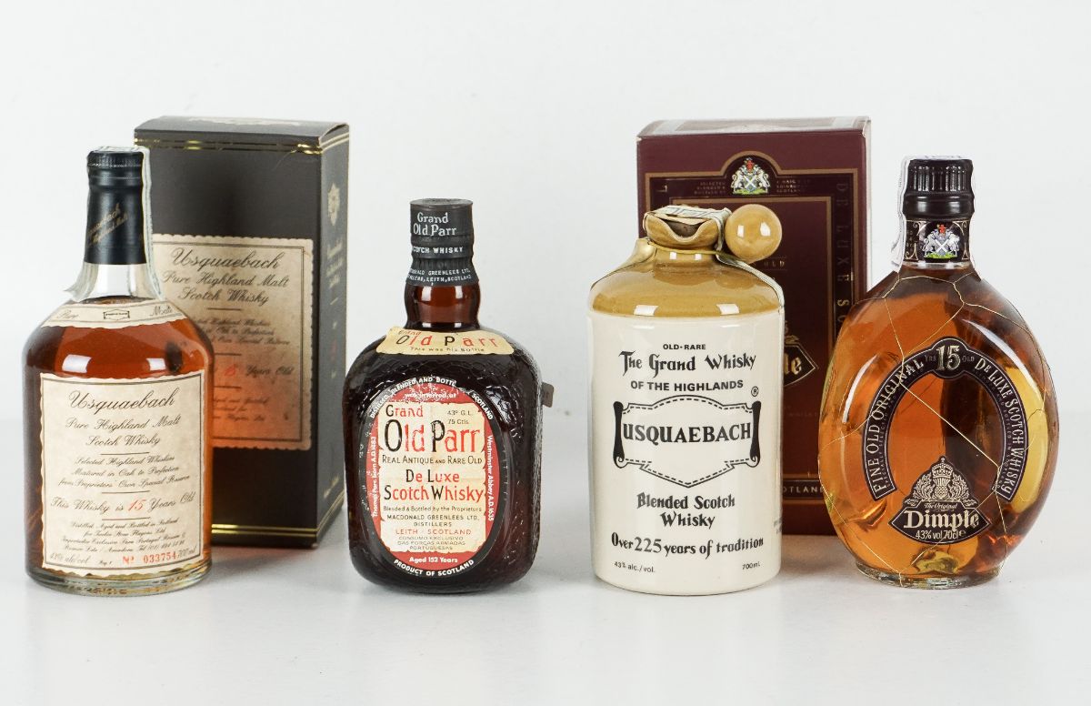 Quatro Garrafas de Whisky