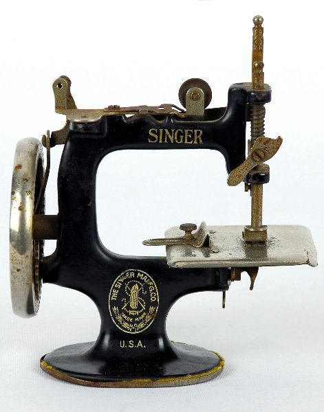 Máquina de costura miniatura Singer
