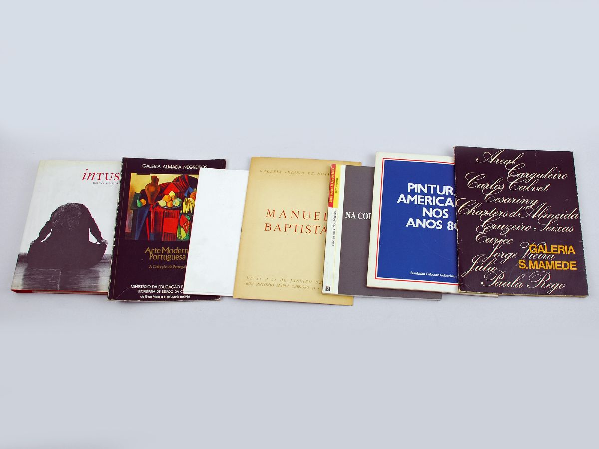 Lote de 6 Catálogos e 1 Livro