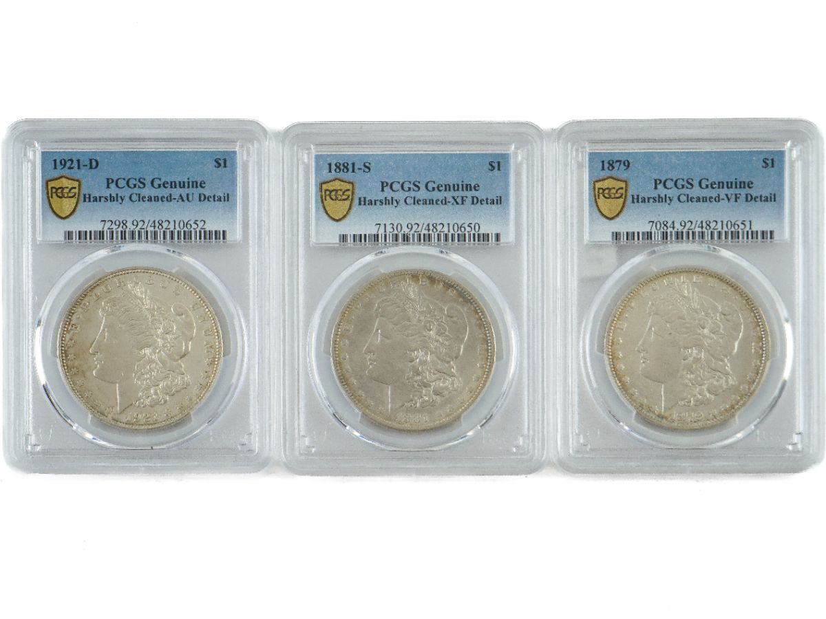 3 Moedas de um dólar de prata