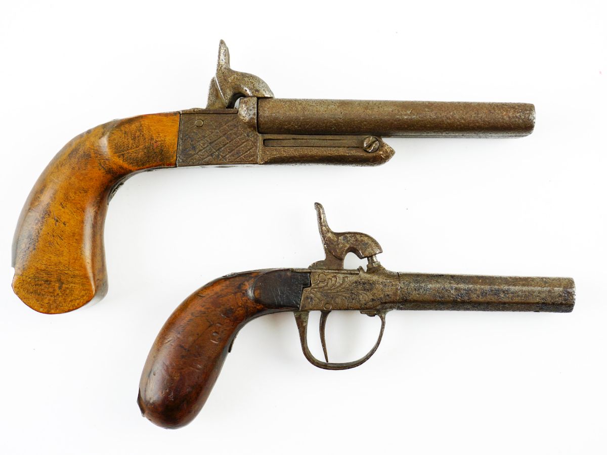 2 Pistolas