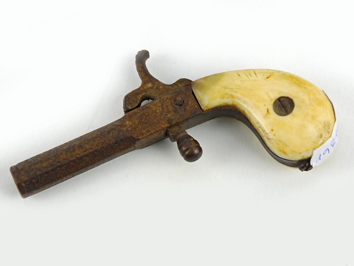 Pistola miniatura