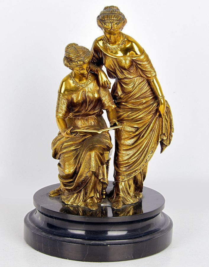 2 Figuras femininas a ler