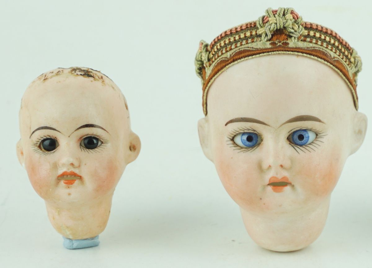 2 Cabeças de boneca