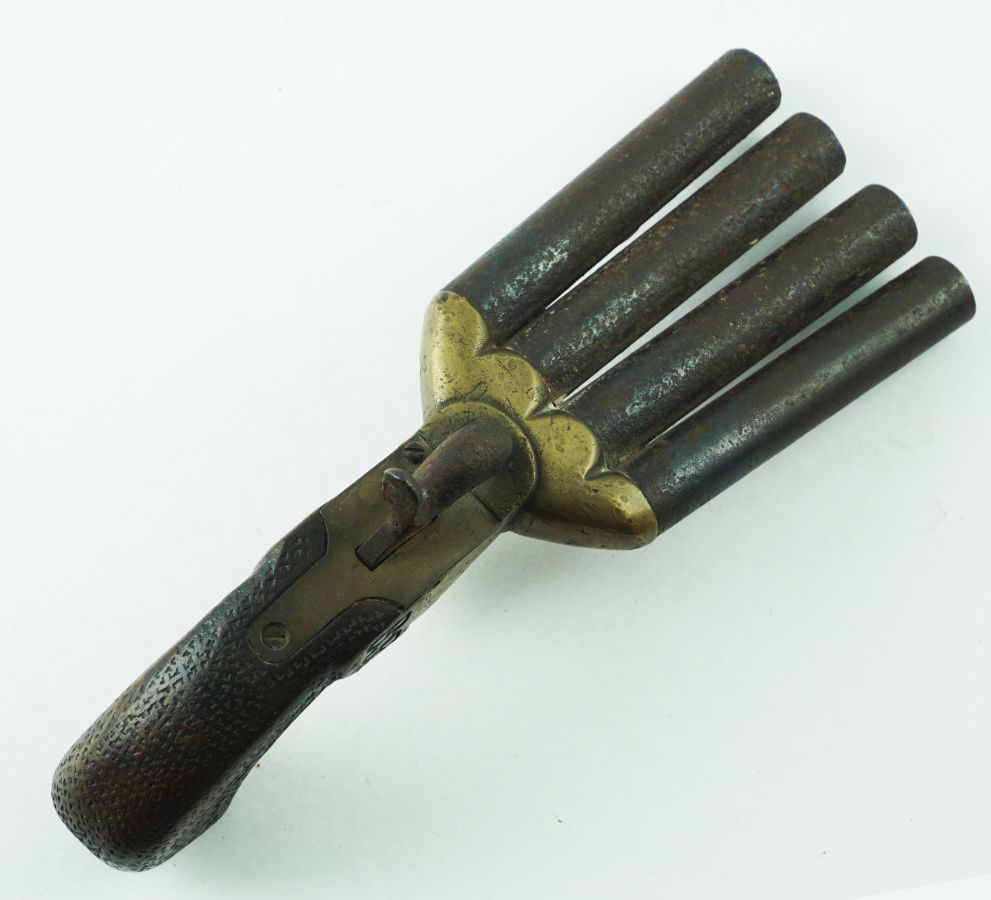 Pistola de percussão de 4 canos
