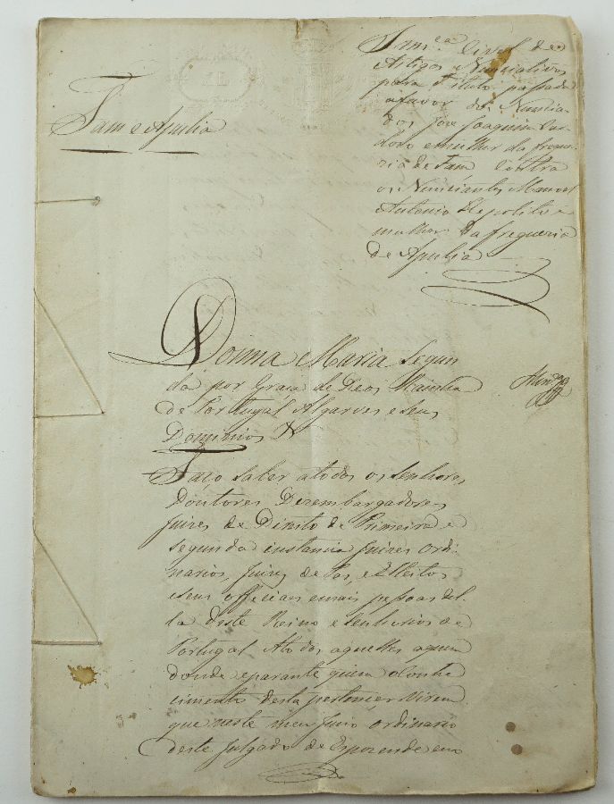 Manuscrito sobre papel selado, 27 fólios cosidos