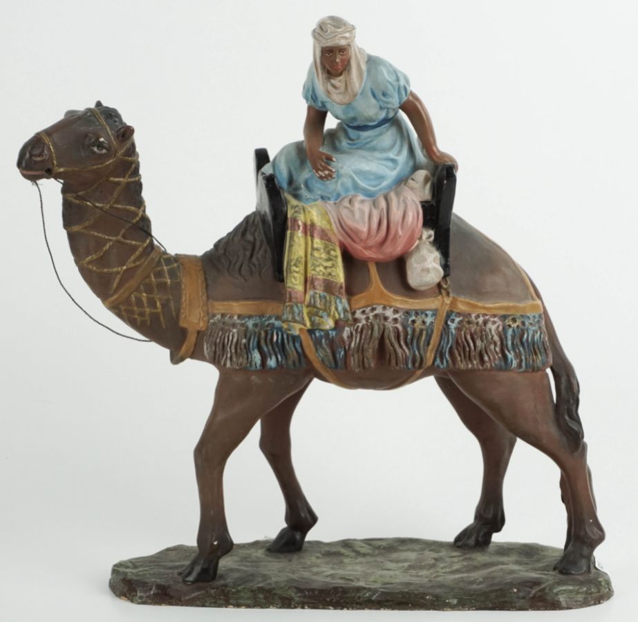 Mulher a passear de camelo